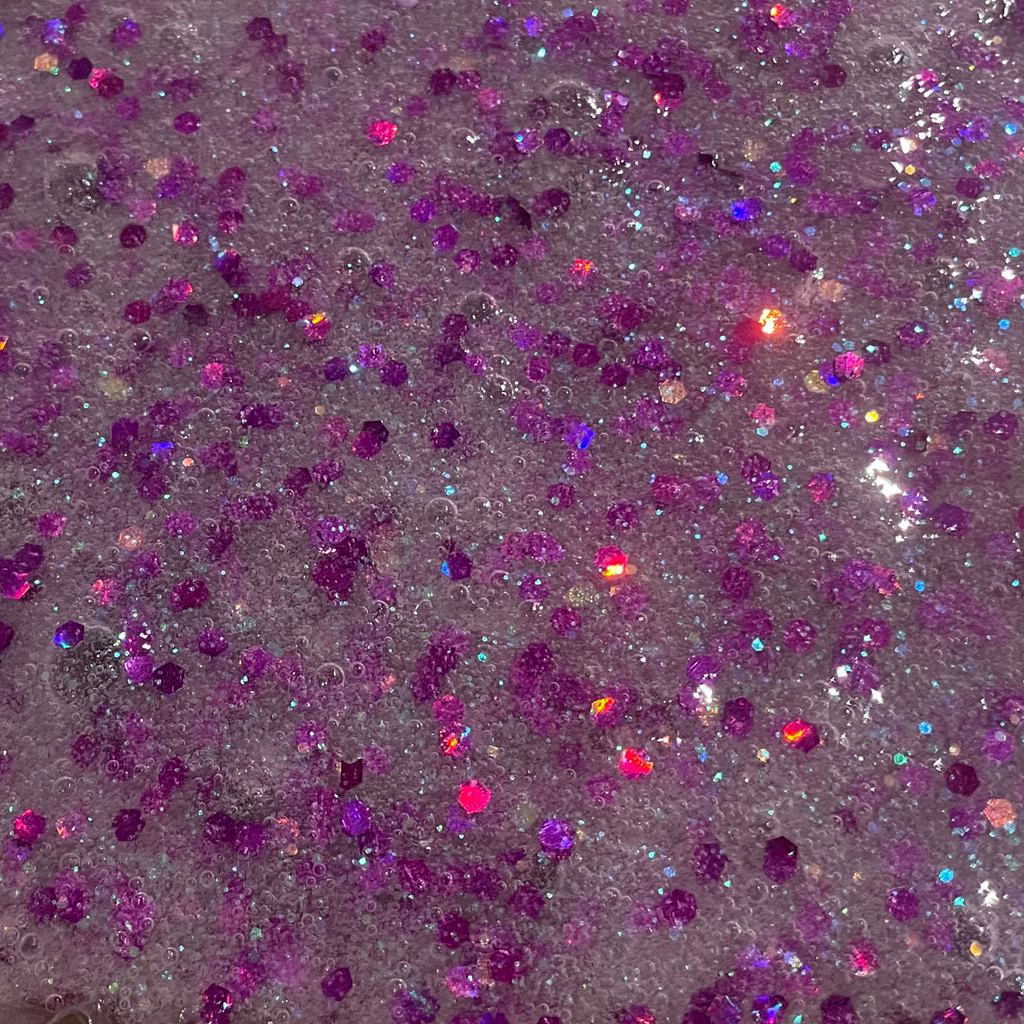 Grape Snow Cone Slime Kits Purple glittery texture with a dark background