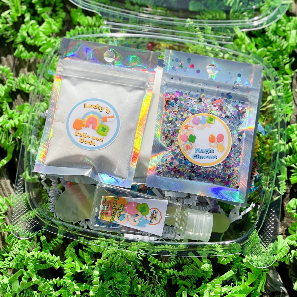 open container of march slime kit ingredients for st. patricks day on a bed of grass