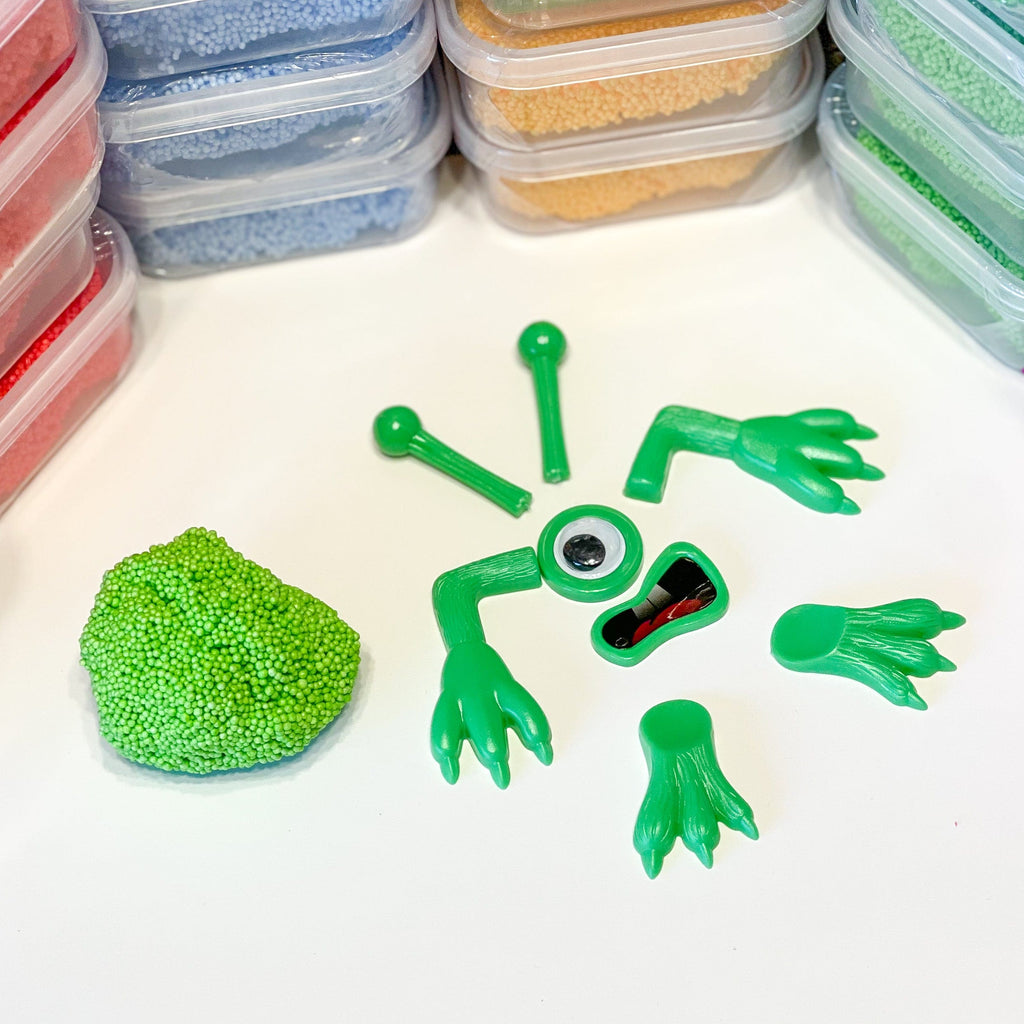 green monster putty play diy kids toy pieces of green monsters and putty