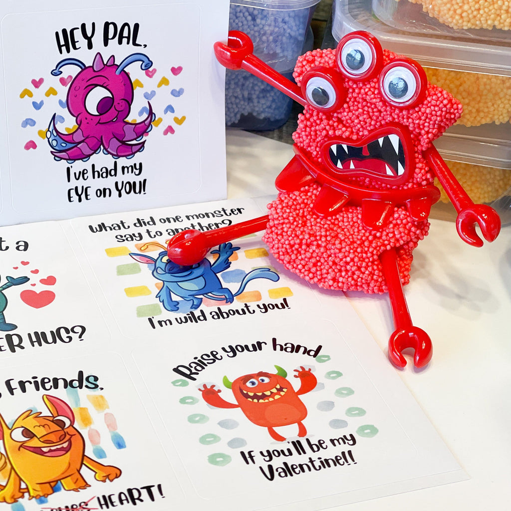 Create Your Own Putty Monster kids toy for artistic exploration, red putty and red arms and legs on a table with monster stickers great for halloween or anytime