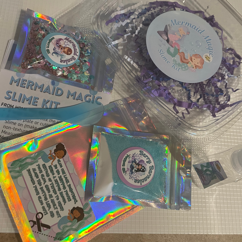 Mermaid Magic Slime Lit with packaging and materials on a white surface 