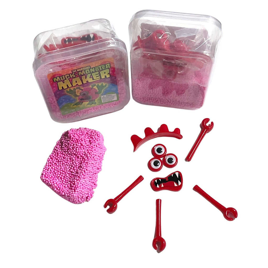 Pink foam and red parts for making monsters on a white background