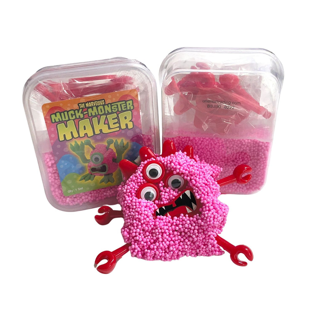 pink and red putty monster with packaged putty in the background - white background, children's toys