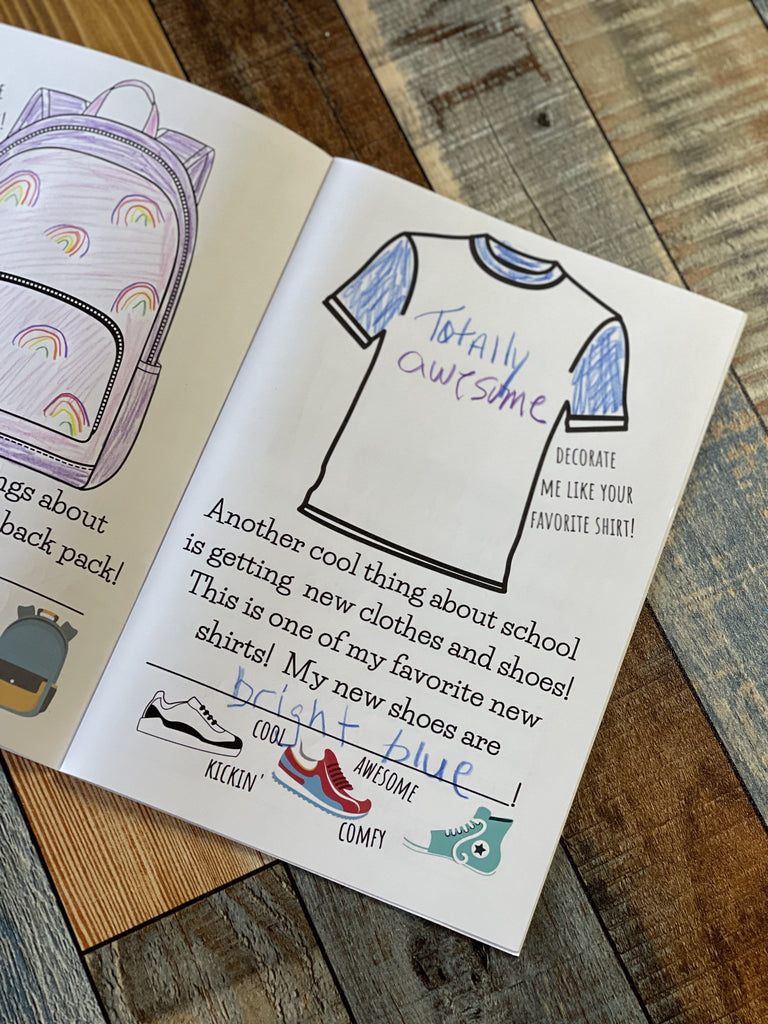 Best School Year Ever Book inner page showing backpack and clothes already filled in using crayons