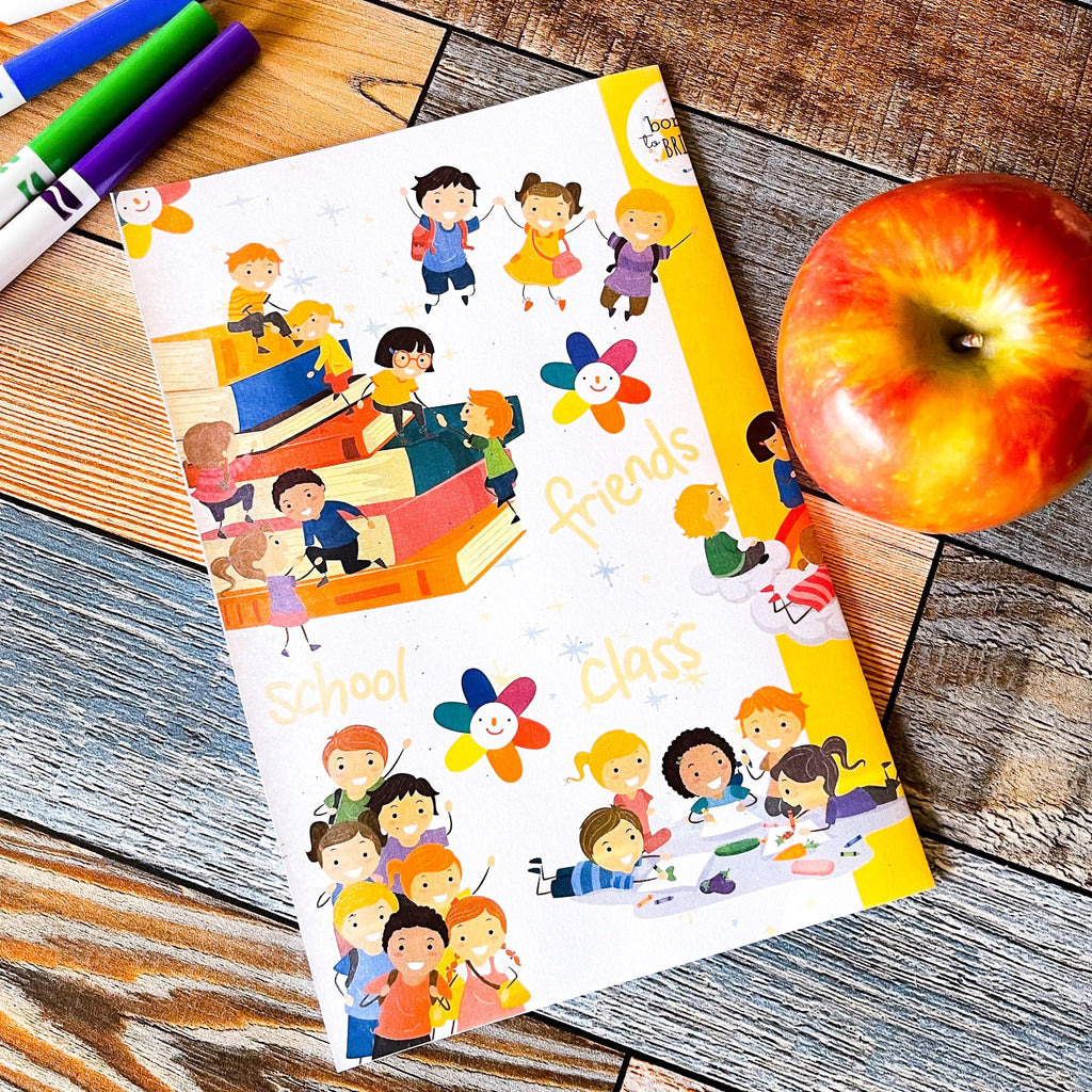 Best Teacher Ever Kids Book, Written by Your Child! back cover on table with apple and markers