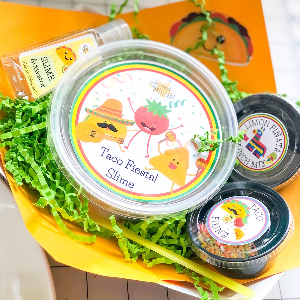 Taco fiesta slime kit ingredients in containers and ready to be packaged, each container says what's inside on the labels, limon pinata mix, taco fixings