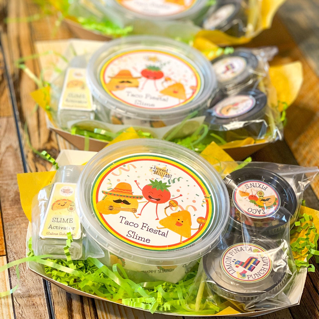 diy slime kits on serving taco containers, meant to look like serving tacos from a food truck but it has the diy slime kits instead of tacos