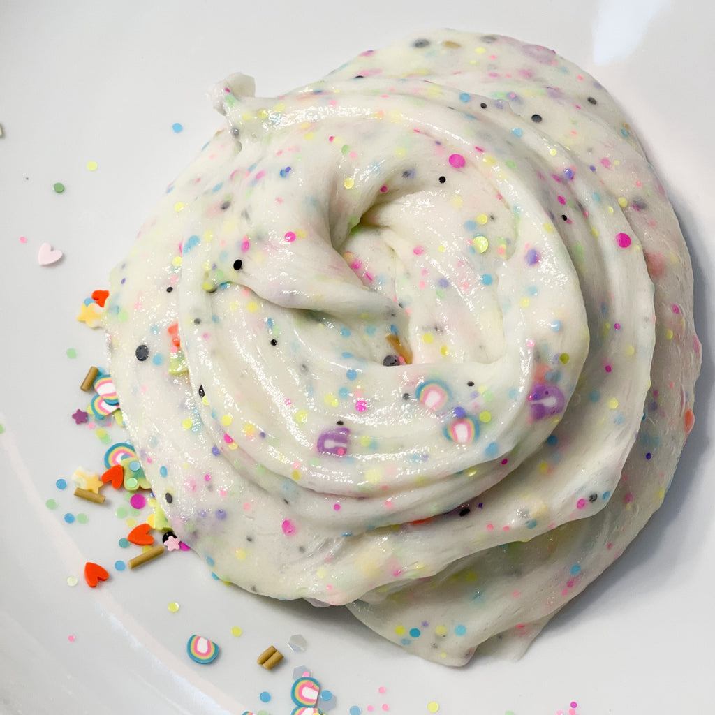 Lucky slime kit, white on a plate with confetti, sensory play for kids